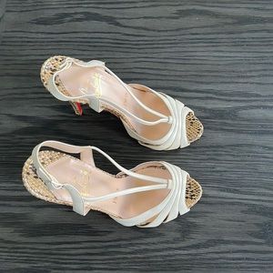 Christian Louboutin snakeskin heels, size 6 1/2